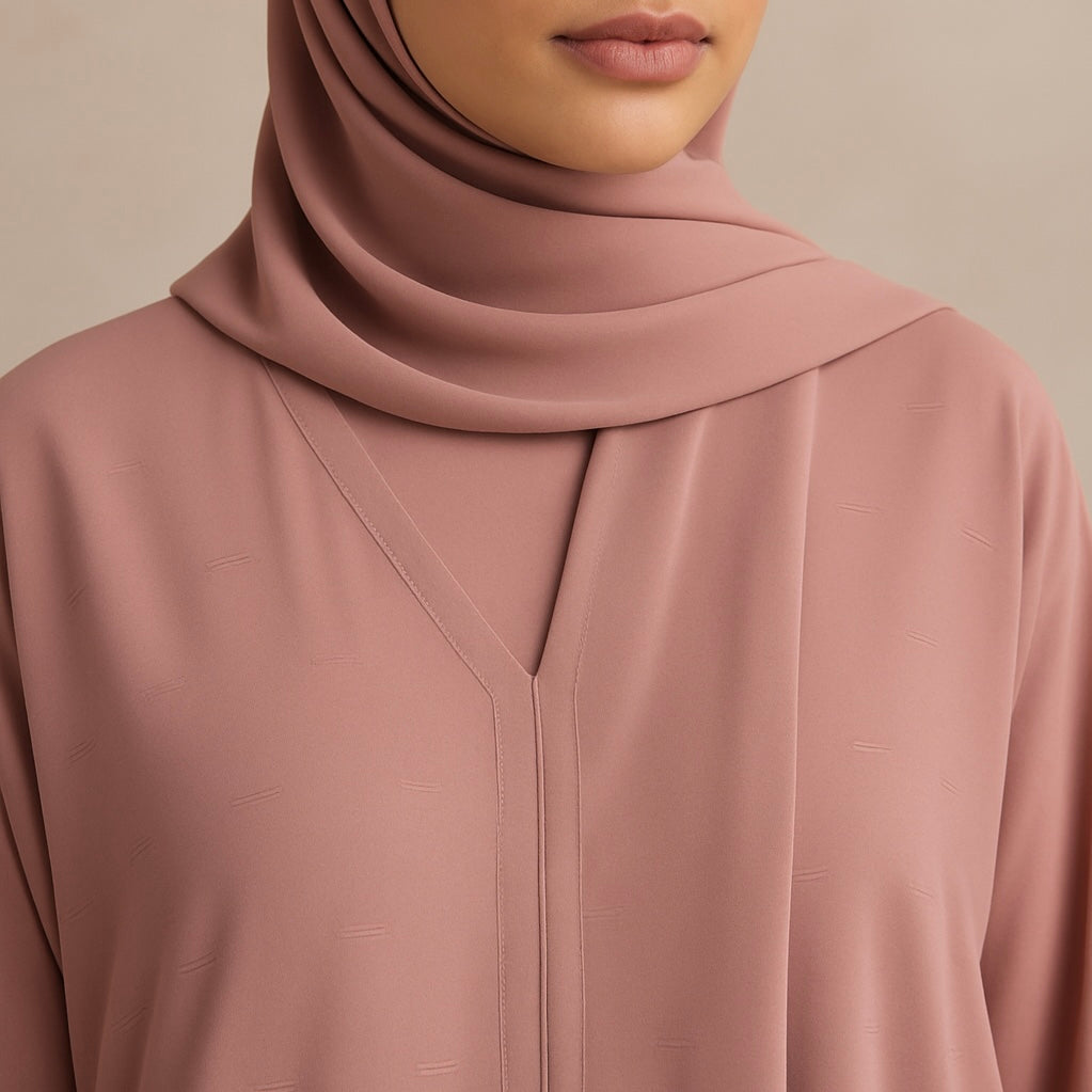 Zanattire pink Korean nida abaya with matching hijab and soft textured fabric for a modest elegant look.