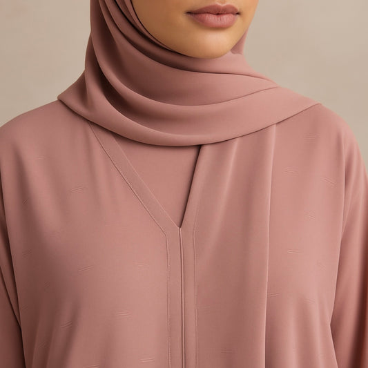 Zanattire pink Korean nida abaya with matching hijab and soft textured fabric for a modest elegant look.